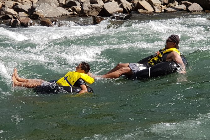 River Tubing Fiji, Navua River - Swimming beneath the waterfall